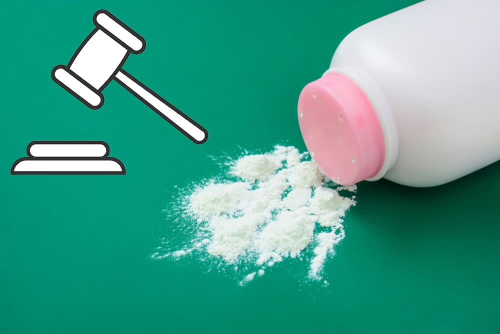 talcum powder container on green background