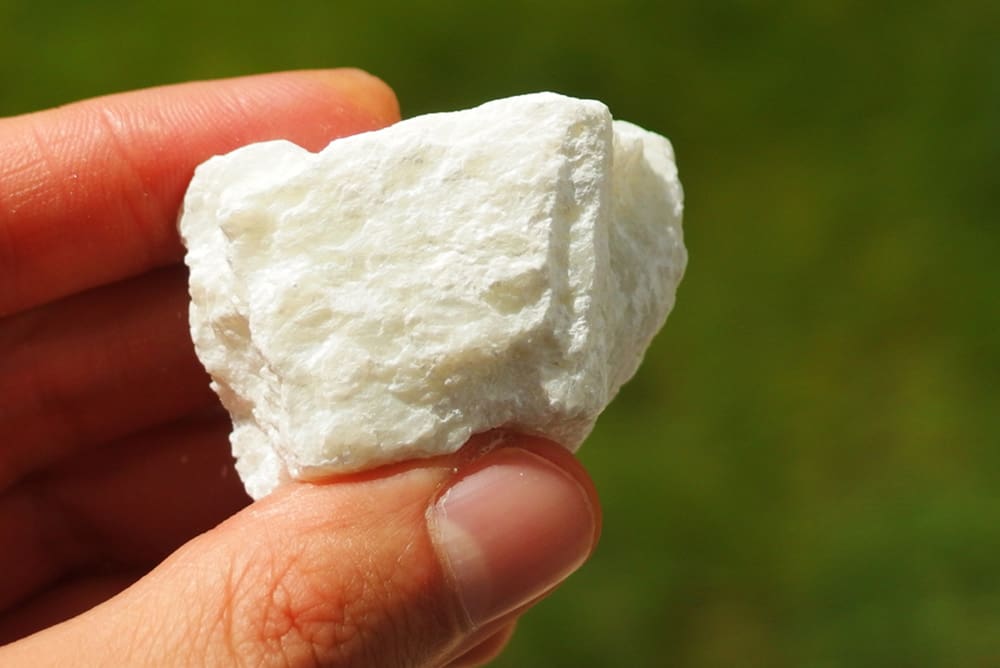talc mineral held in a hand