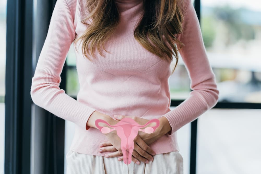 woman hands touching female reproductive system